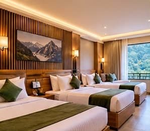 Triple Bed Luxury Room at Ganga Veda